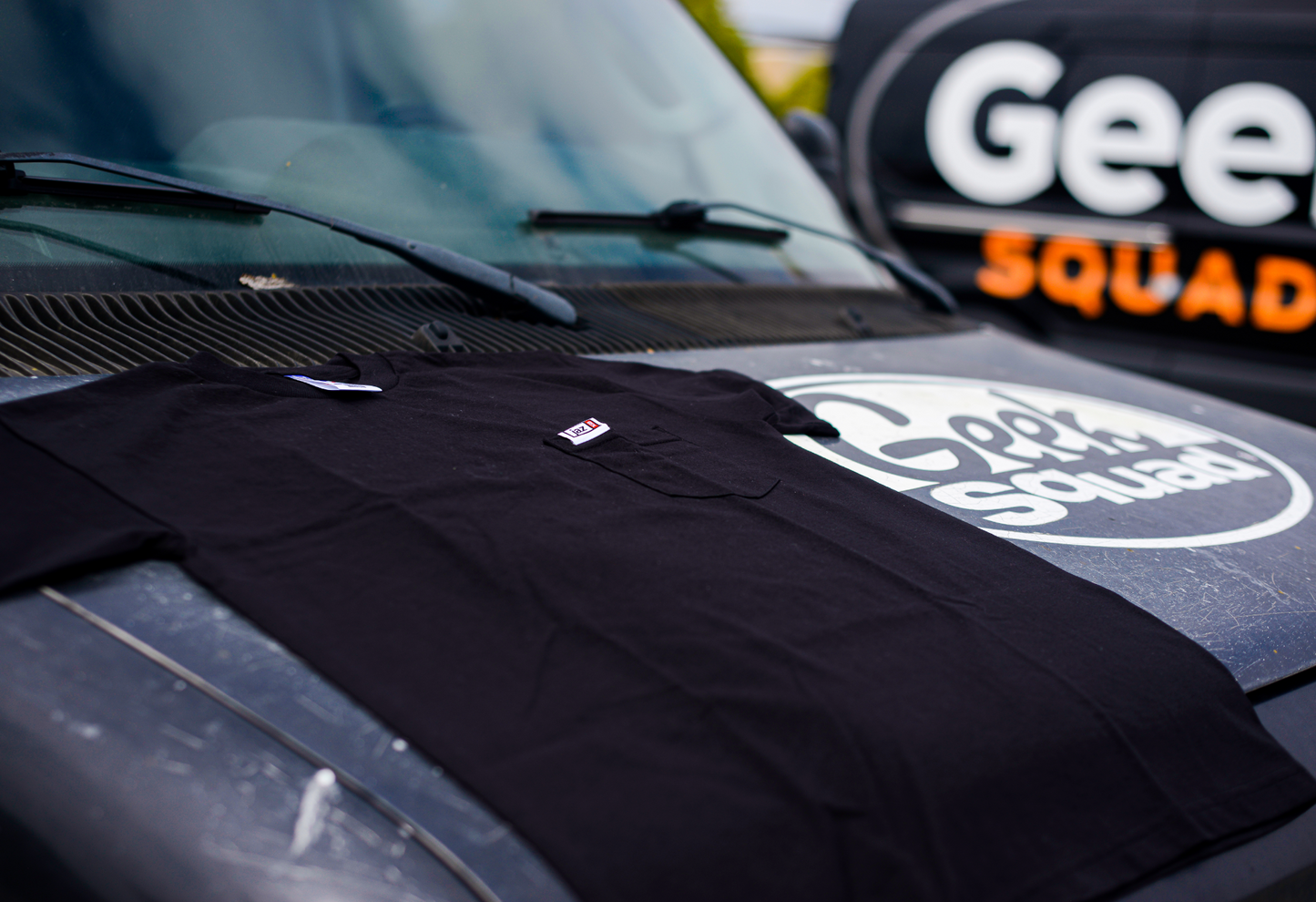 JAZ 1GB black pocket t-shirt detail view, officially licensed THICCC SHIRT