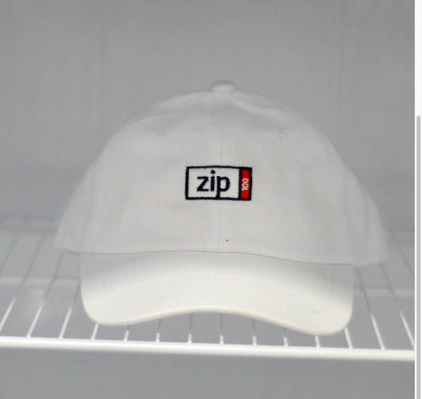 ZIP white dad hat detail, officially licensed Iomega-era headwear