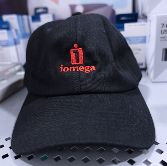 Officially licensed IOMEGA dad hat in matte black, 6-panel CROWN COVER with embroidered logo
