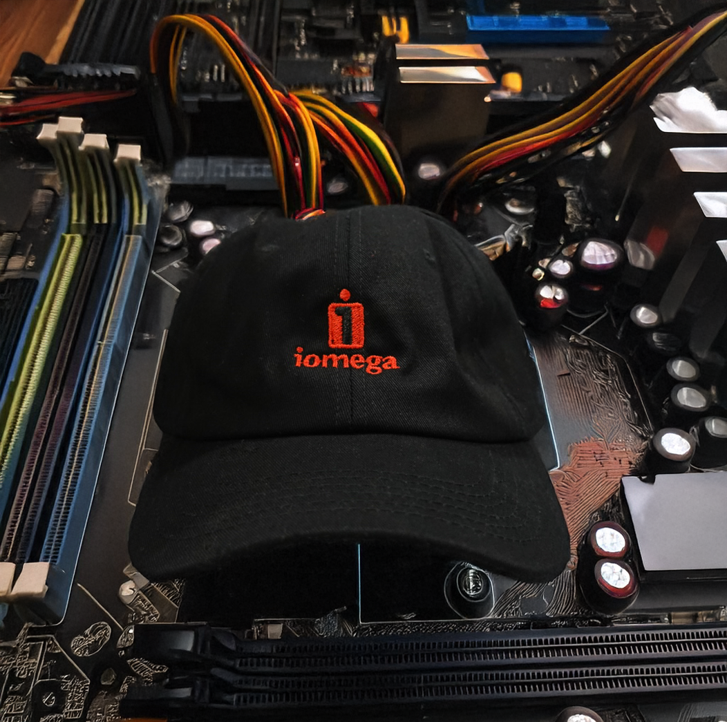 Officially licensed IOMEGA dad hat in matte black in a computer, 6-panel CROWN COVER with embroidered logo
