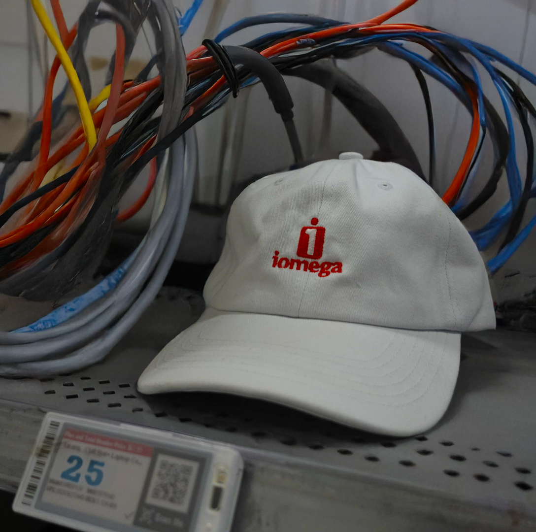 Officially licensed IOMEGA dad hat in clean white, 6-panel CROWN COVER with embroidered logo

