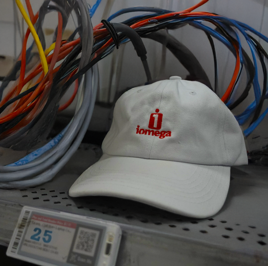 Officially licensed IOMEGA dad hat in clean white, 6-panel CROWN COVER with embroidered logo
