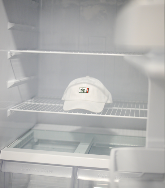 Officially licensed ZIP 100MB dad hat in clean white, 6-panel BOOM DADDY with embroidered logo